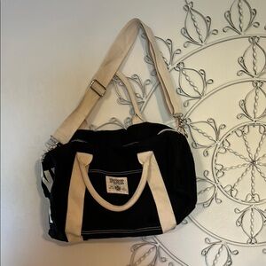 PINK duffel/overnighter bag black & cream excellent condition.